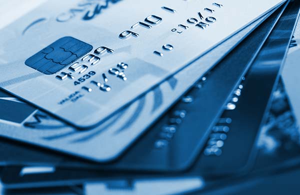 several credit cards arrayed on a table